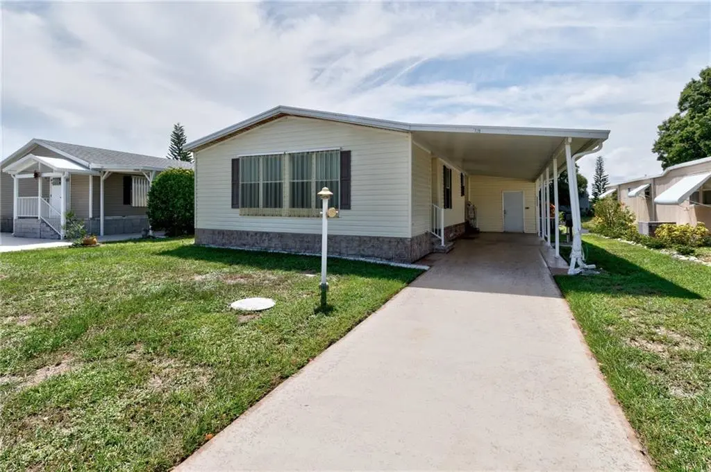 729 Barefoot Bay Front of House Current Listing